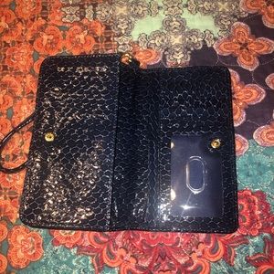 Brahmin navy blue snakeskin clutch